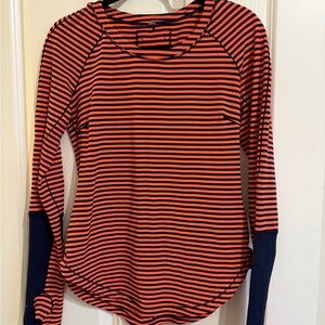 Lululemon base long sleeve running shirt, orange and navy.